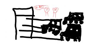 Several trucks were parked in front of the fence 