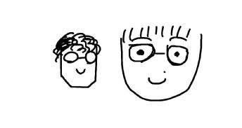 Two smiling friends wearing glasses 