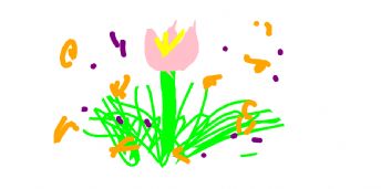 Pink tulips bloom amidst the green grass 